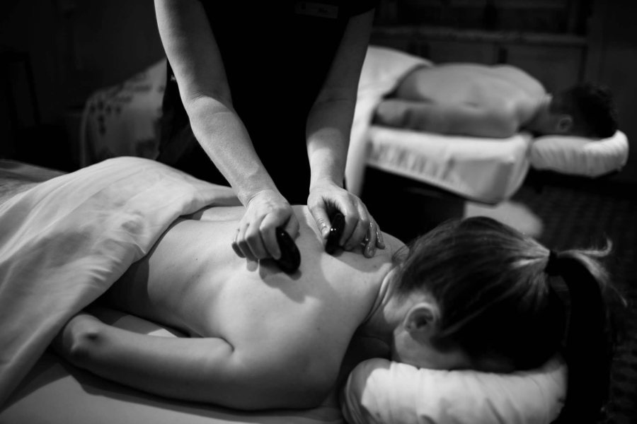 woman enjoying a massage at the spa